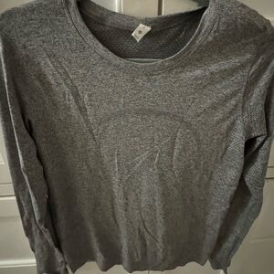Gray long sleeve Lulu Lemon athletic top, size 6